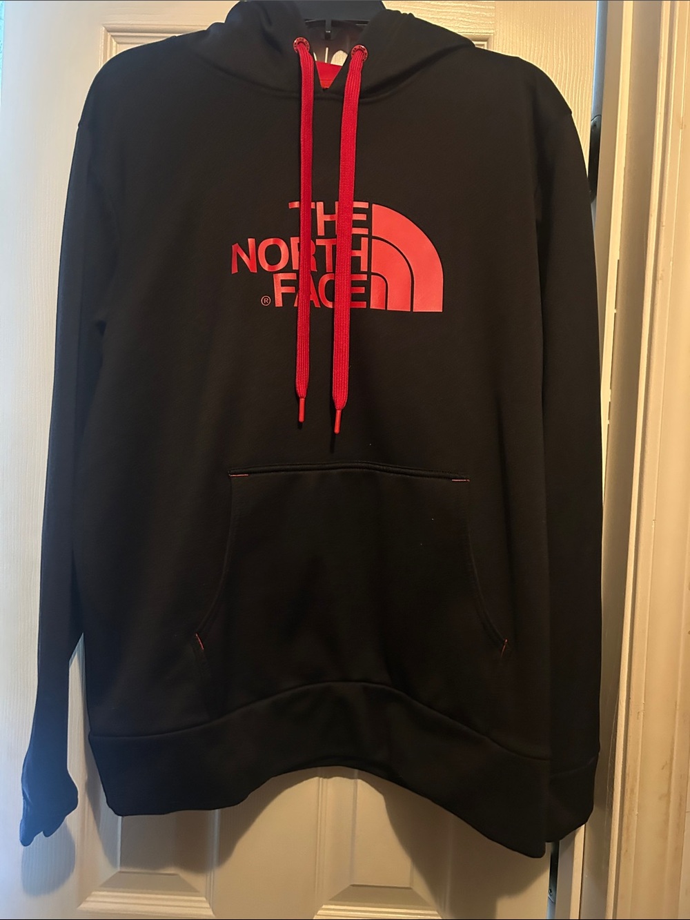 The North Face Black Hoodie with Red Logo and Drawcords